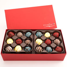 Our decadent assorted gourmet chocolate truffles are a treat that you don't want to miss! Impress your gift recipient with a 36 count box of hand dipped, perfectly baked, chocolate filled truffles that they can truly enjoy to the core. This colorful box of chocolates will be a great addition to any occasion and celebration for any true chocolate lover!